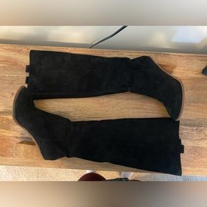 Tall black suede boots